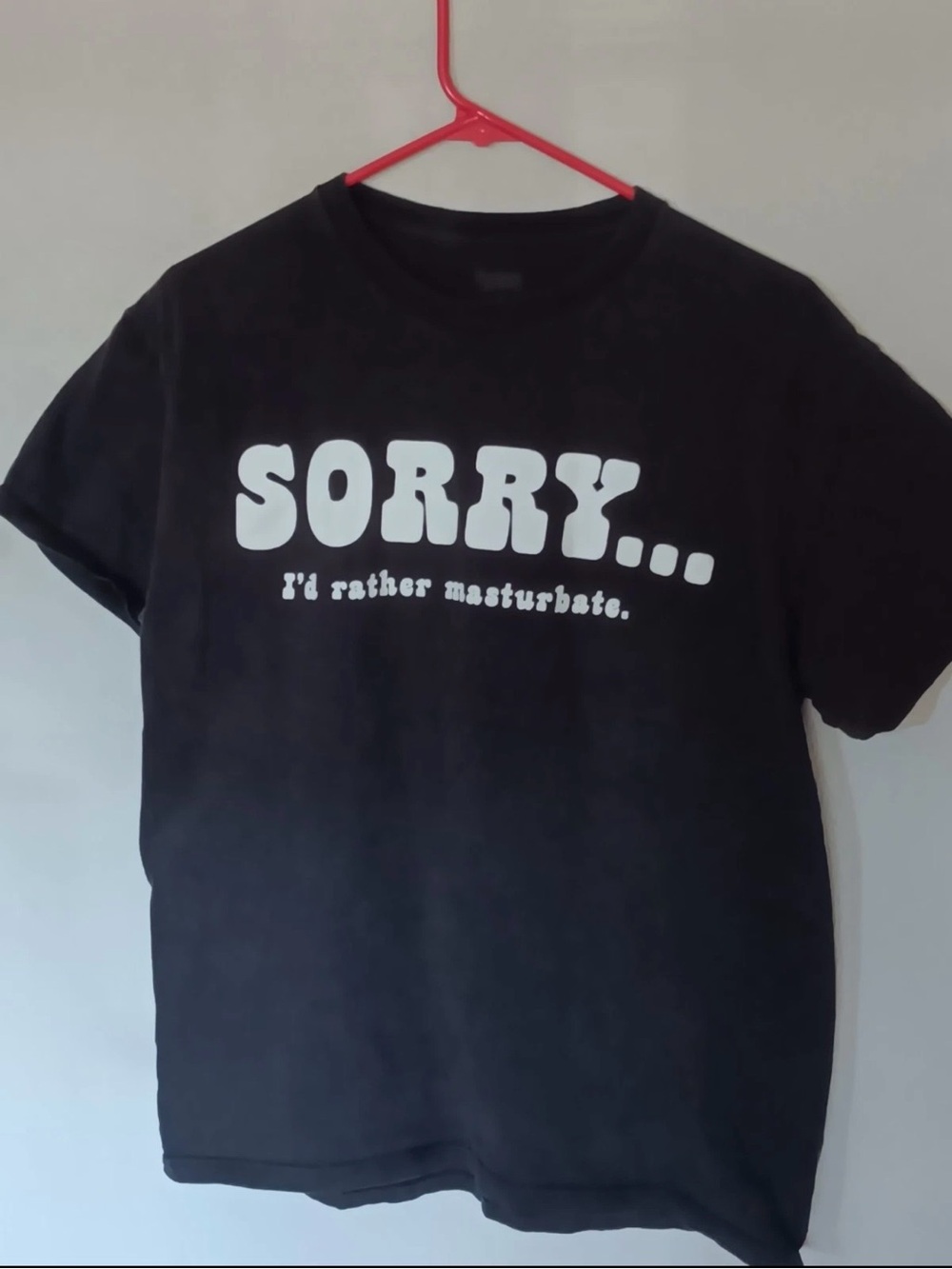 Spencer's Black Graphic Tee with White 'SORRY' Text
